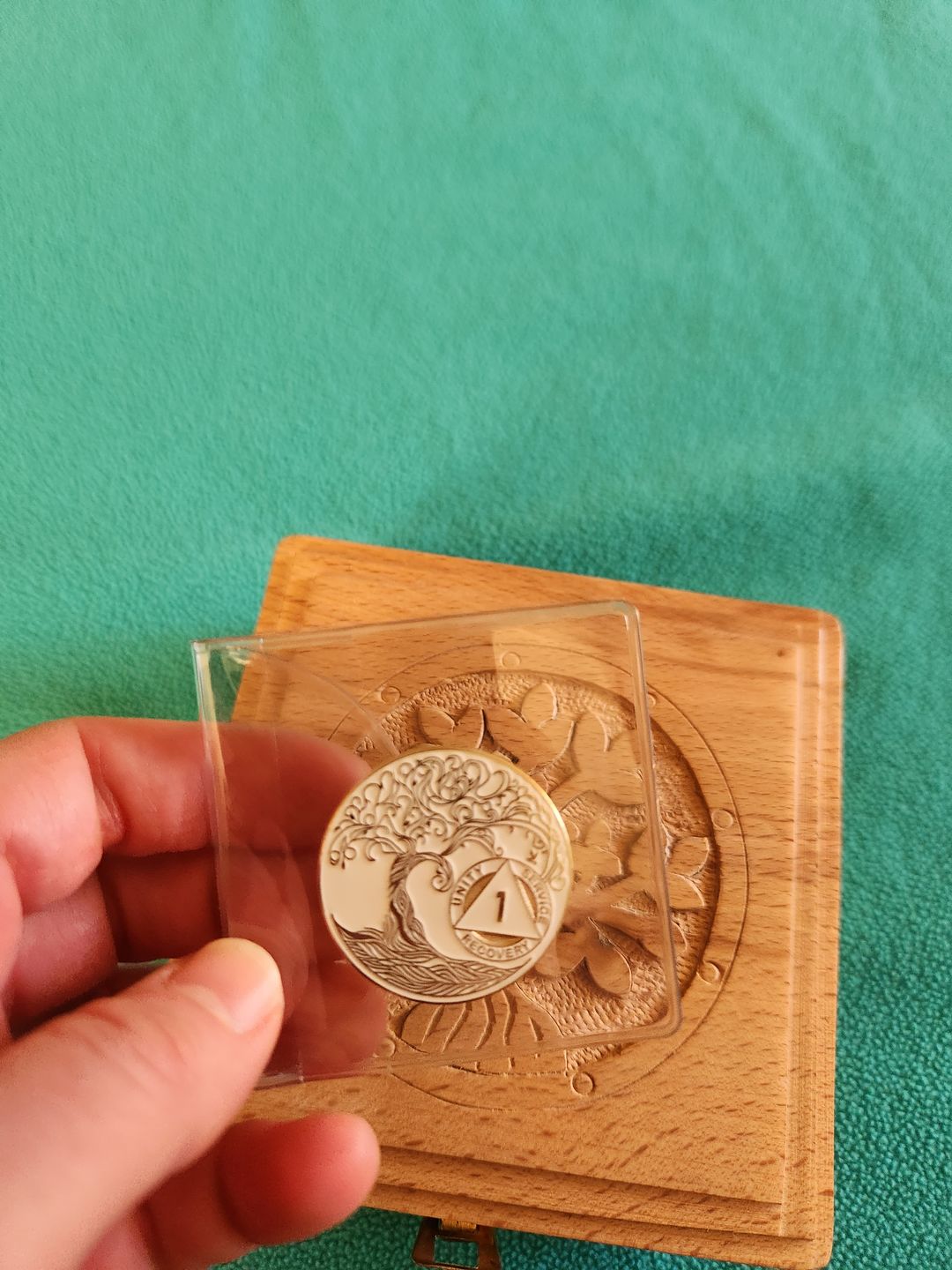Customer photo review of 1 Year Sobriety Mint Twisted Tree of Life Gold Plated AA Recovery Medallion - One Year Chip/Coin - White