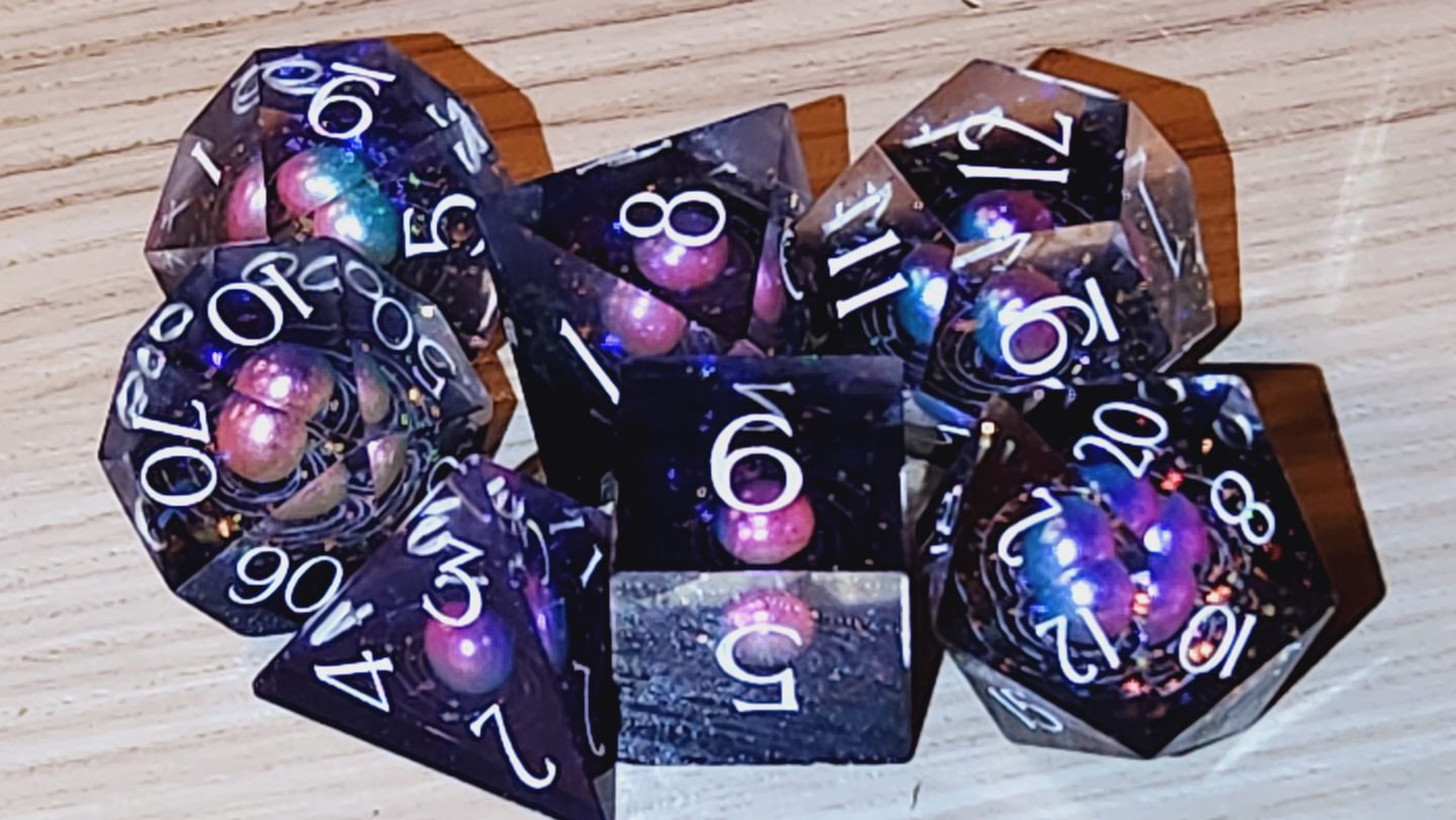 Customer photo review of URWizards D&D Resin Engraved Dice Set The Galaxy