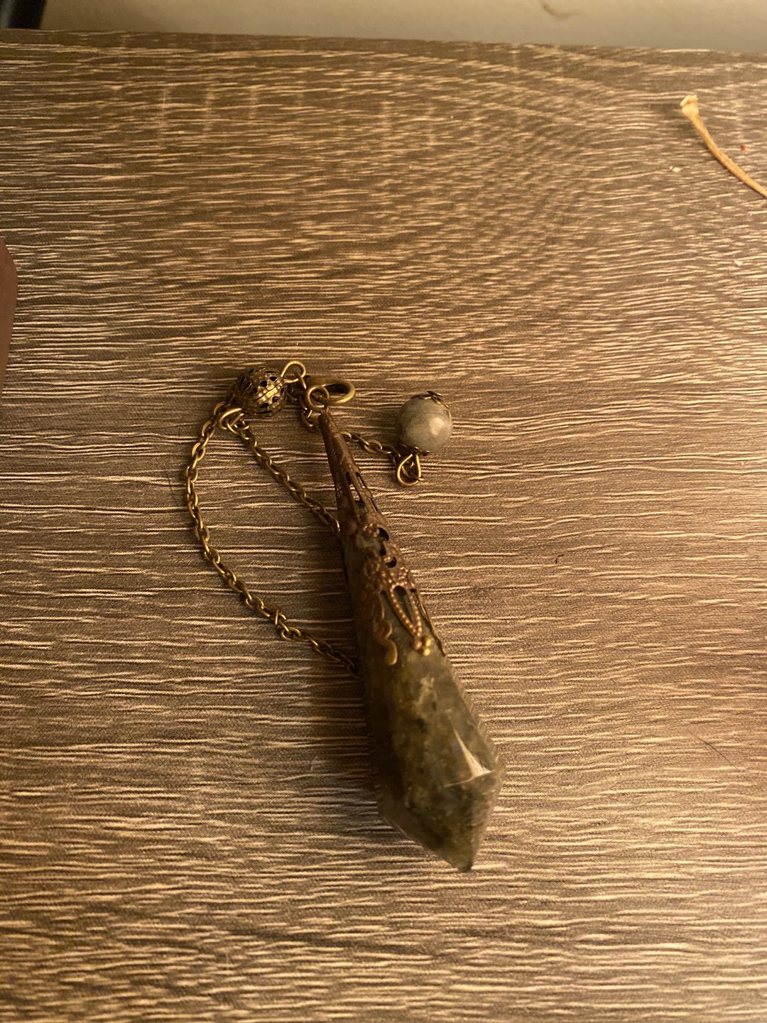 Customer photo review of Mystical Labradorite Crystal Pendulum