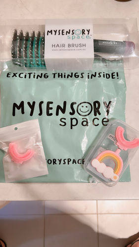 Customer photo review of My Sensory Space Detangling Hairbrush