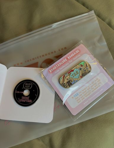 Customer photo review of BTS Bangtancore Bandaid Enamel Pins
