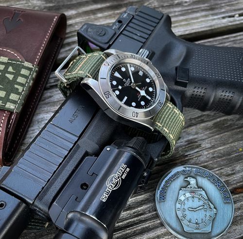 Customer photo review of W.O.E. Travel Pouch and Challenge Coin