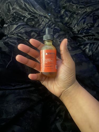 Customer photo review of Super Growth Oil