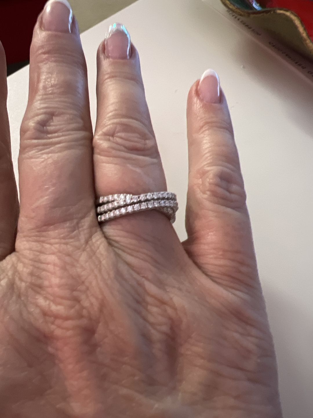 Customer photo review of Triple Criss-Cross Moissanite Pave Half Eternity Wedding Band Ring