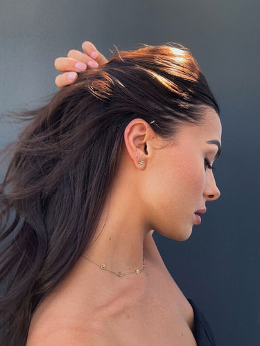 Customer photo review of Swish Stud Gold Earrings