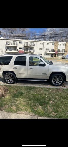 Customer photo review of 2007-2013 GMC Yukon XL 1500 4-Wheel Air Suspension Conversion/Delete Kit With Camber Bolts and Light Fix Module (GC24FMCK1)