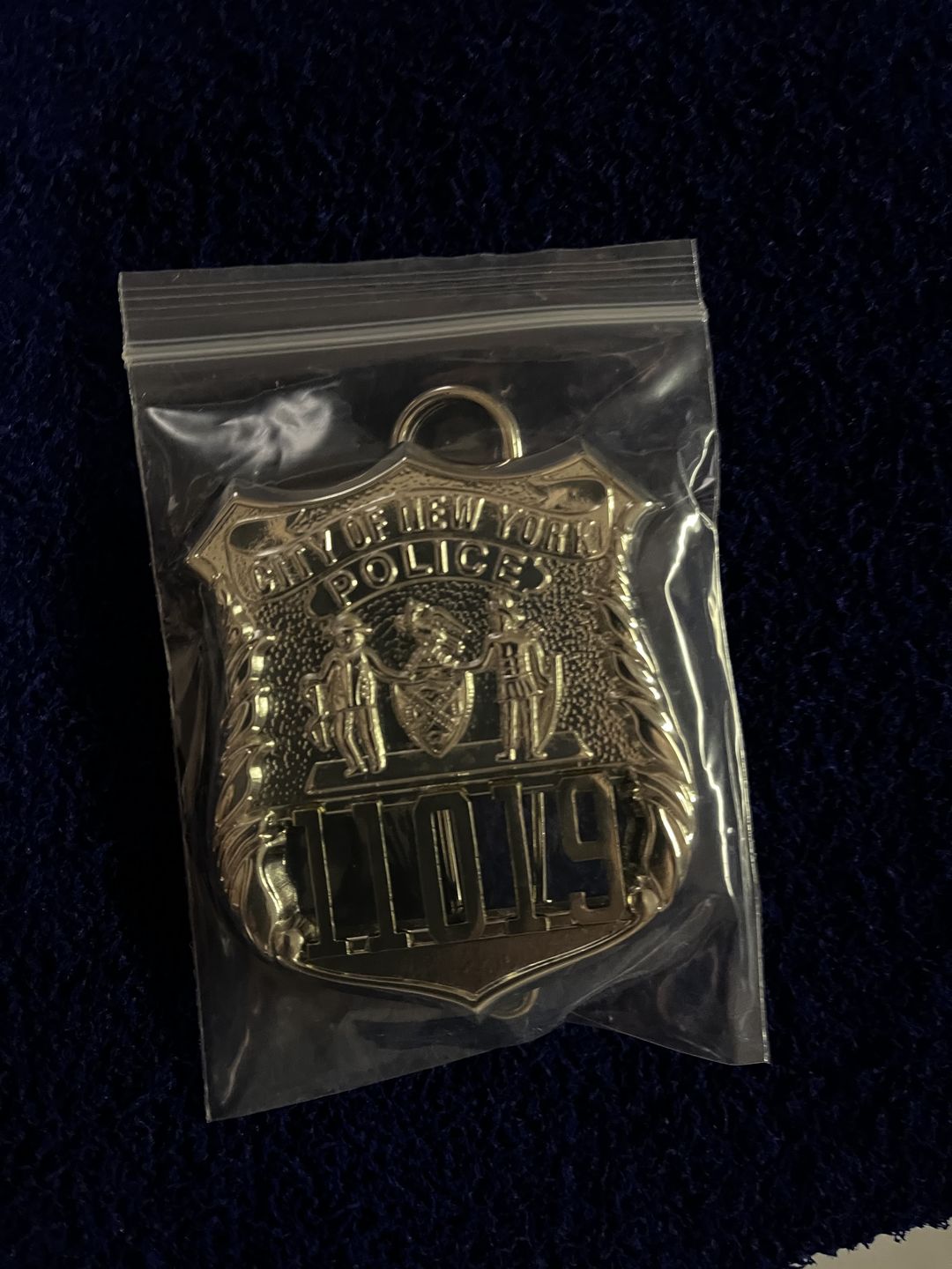 Customer photo review of NY New York Police Officer Badge Replica Movie Props *Customizable Badge Number*