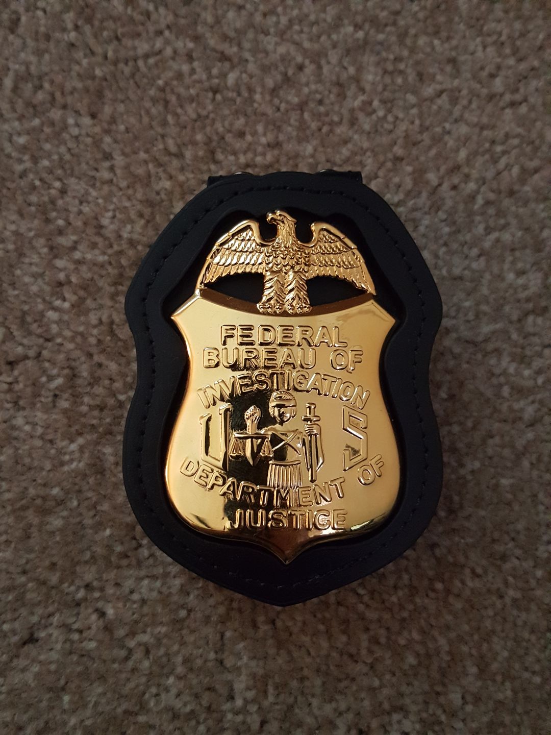 Customer photo review of FBI Department of Justice Badge Solid Copper Replica Movie Props