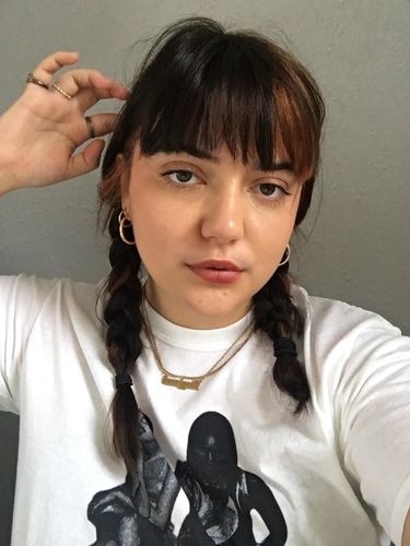 Customer photo review of 'After Party' baby tee