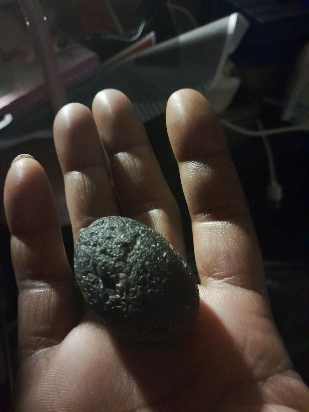 Customer photo review of Tektite Specimen - The Only Crystal on the Planet that can Absorb Dark Energy