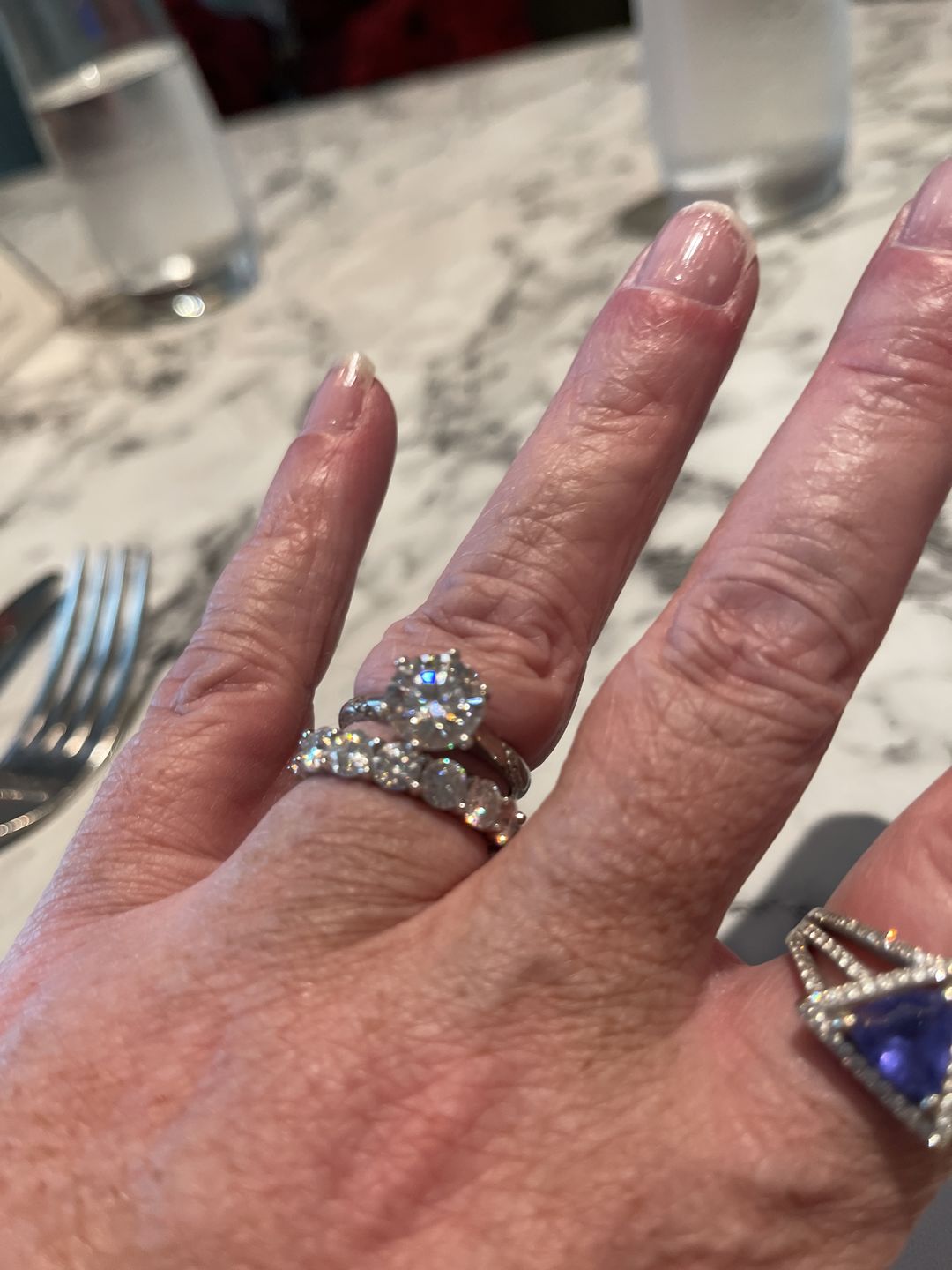 Customer photo review of Round Moissanite Eternity Sterling Silver Wedding Band Ring