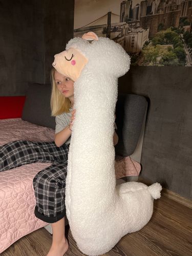 Customer photo review of Alpaca Cuddle Buddy Plush Pillow