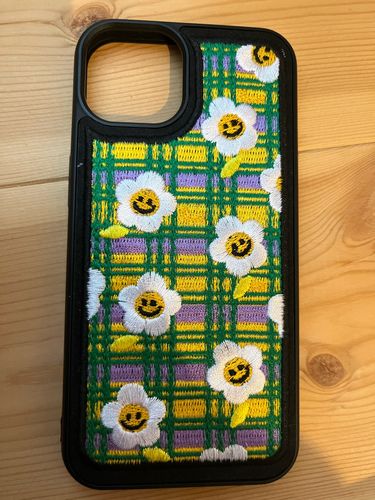 Customer photo review of Embroidered Smiley Sun Flower iPhone Case