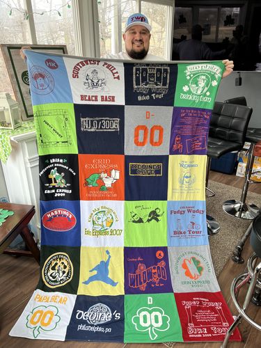 T-shirt quilt with biking, beach activities themes by Sara from PA