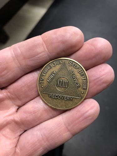 Customer photo review of Recovery Mint 43 Year Bronze AA Meeting Chips - Forty-Three Year Sobriety Coins/Tokens