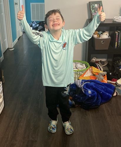 Customer photo review of Big Fish Energy Performance Tee