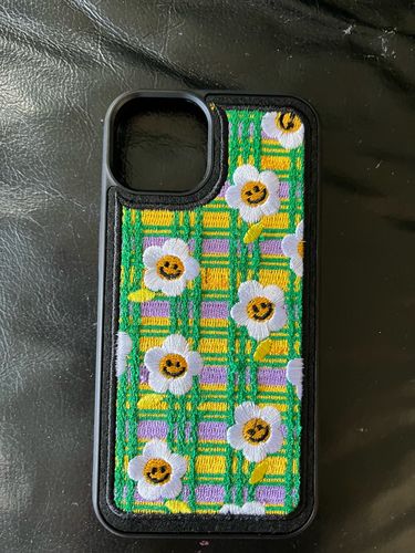Customer photo review of Embroidered Smiley Sun Flower iPhone Case