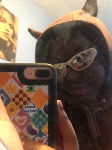 Customer photo review of Embroidered Rhombus Lattice Love Heart iPhone Case