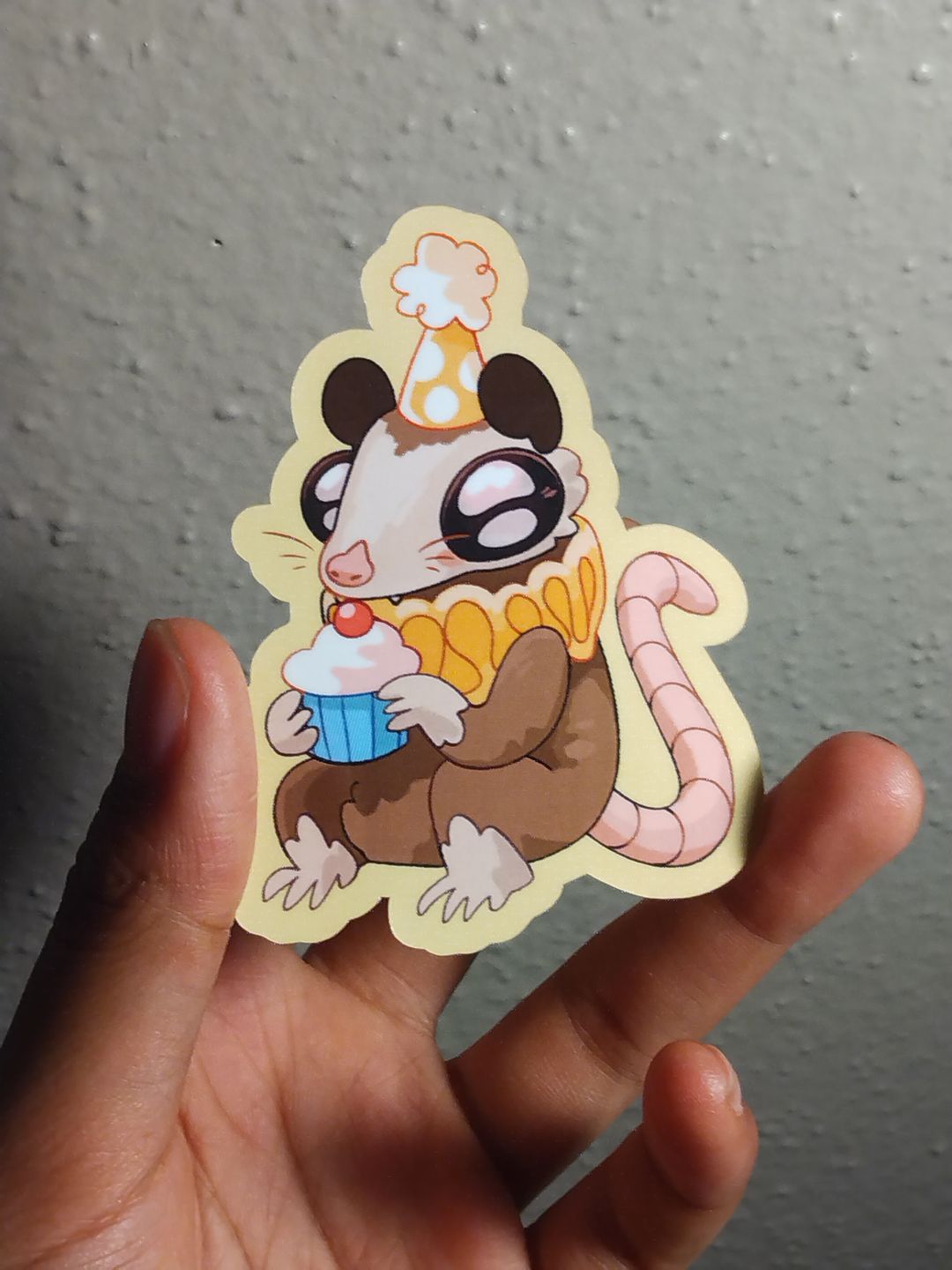 Customer photo review of Sad Party Opossum Stickers!