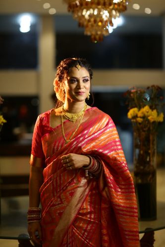 Customer photo review of Classic Orange And Pink Woven Rangkat Banarasi Saree