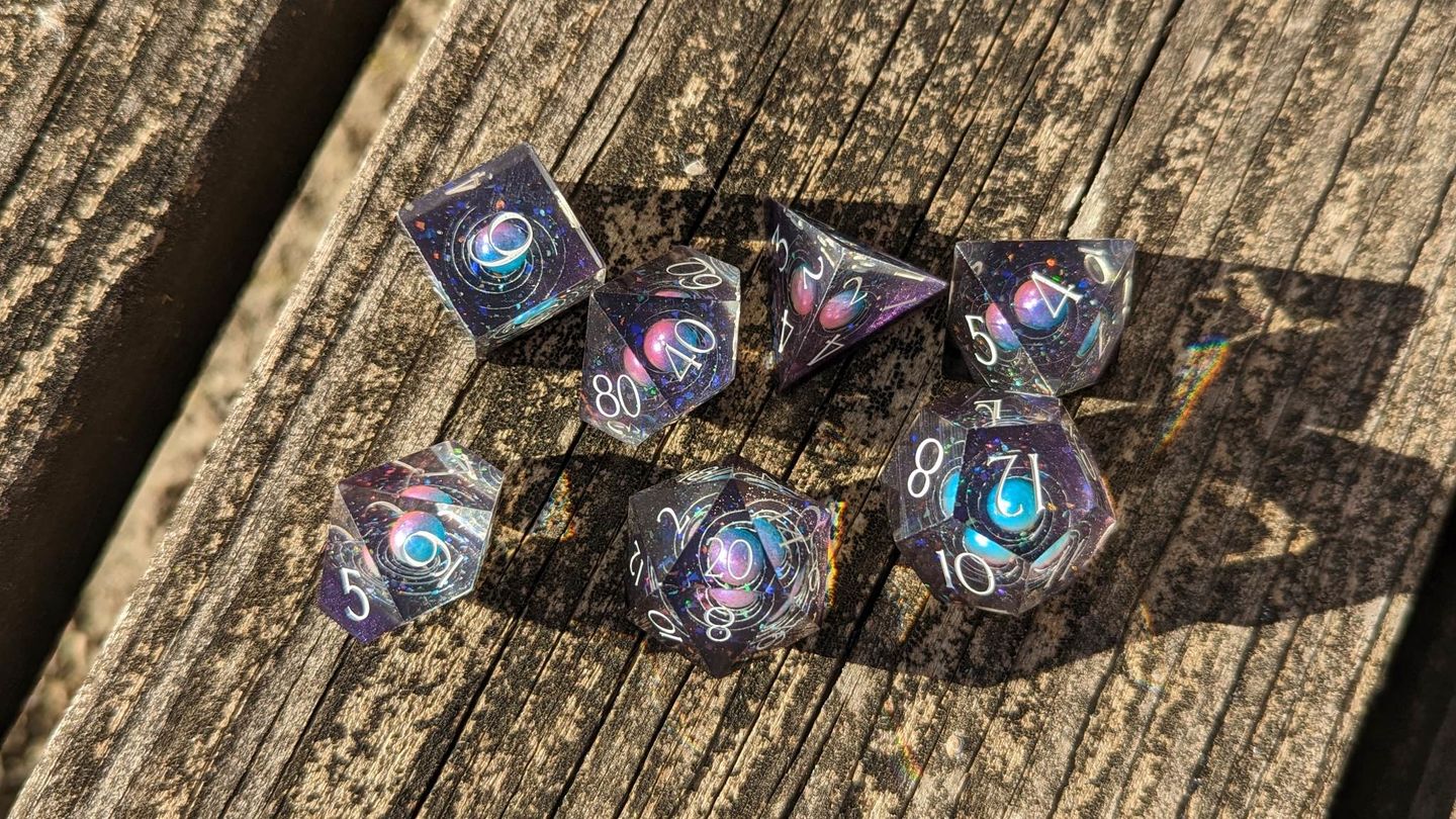 Customer photo review of URWizards D&D Resin Engraved Dice Set The Galaxy