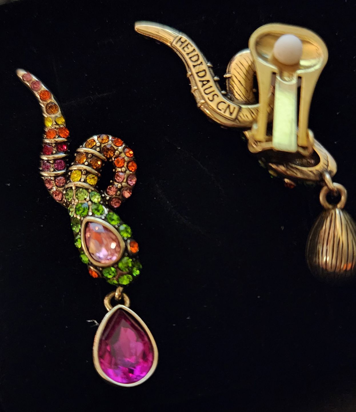 Customer photo review of HEIDI DAUS®"Gorgeous Glimmer Snake" Crystal Snake Dangle Earrings