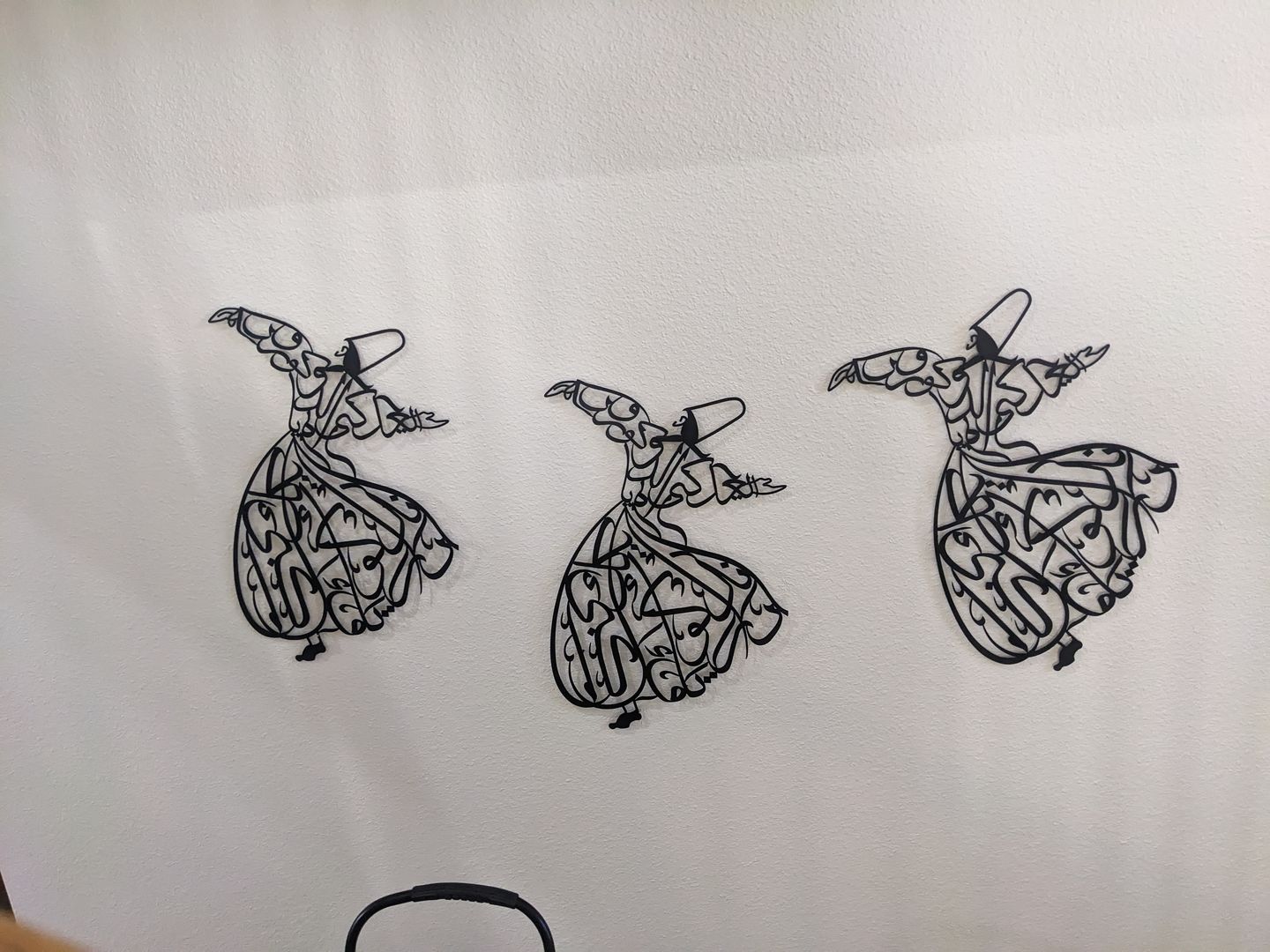 Customer photo review of Whirling Dervish Metal Islamic Wall Art