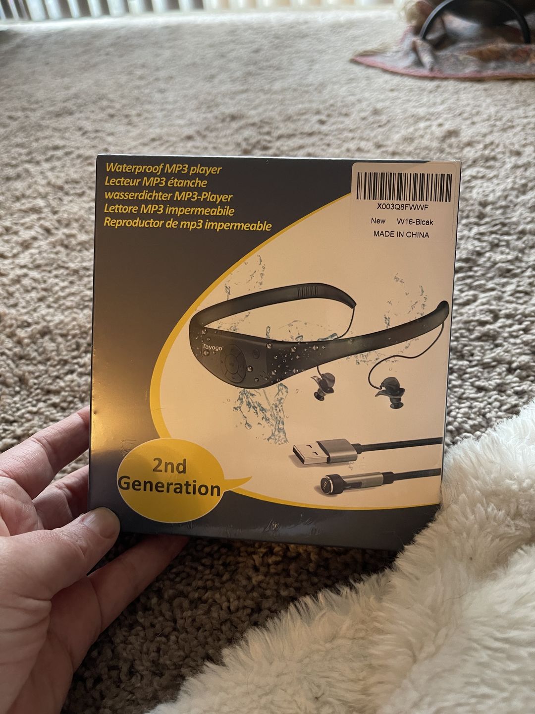 Customer photo review of Tayogo Upgraded 2nd Generation Waterproof MP3 Player - 8GB Memory, Magnetic Charging, Ergonomic Earbuds, FM Mode, Shuffle/Order Playing, IPX68