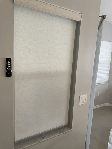 Customer photo review of SmartWings Motorized Light Filtering Roller Shades 70% Blackout Linen