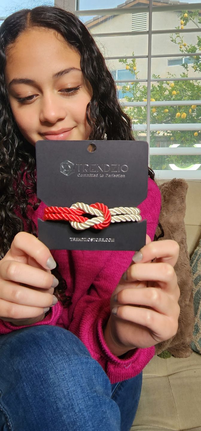 Customer photo review of The Original Love Knot Satin Rope Bracelet- Red and White