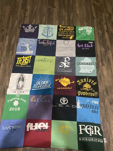 T-shirt quilt with art, community service themes by Faith from LA