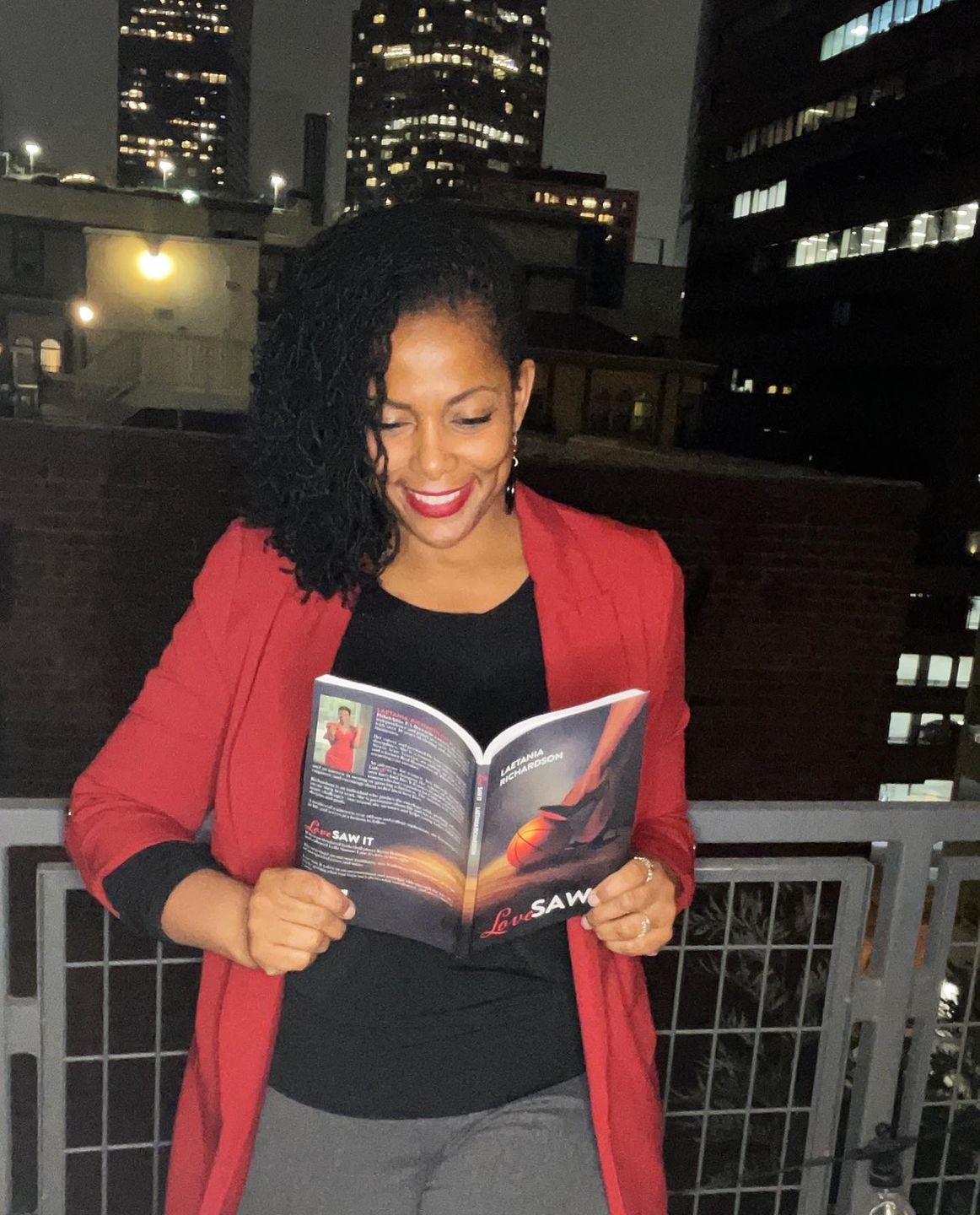 Customer photo review of Autographed Copy -“LOVE SAW IT”- by LAETANIA RICHARDSON