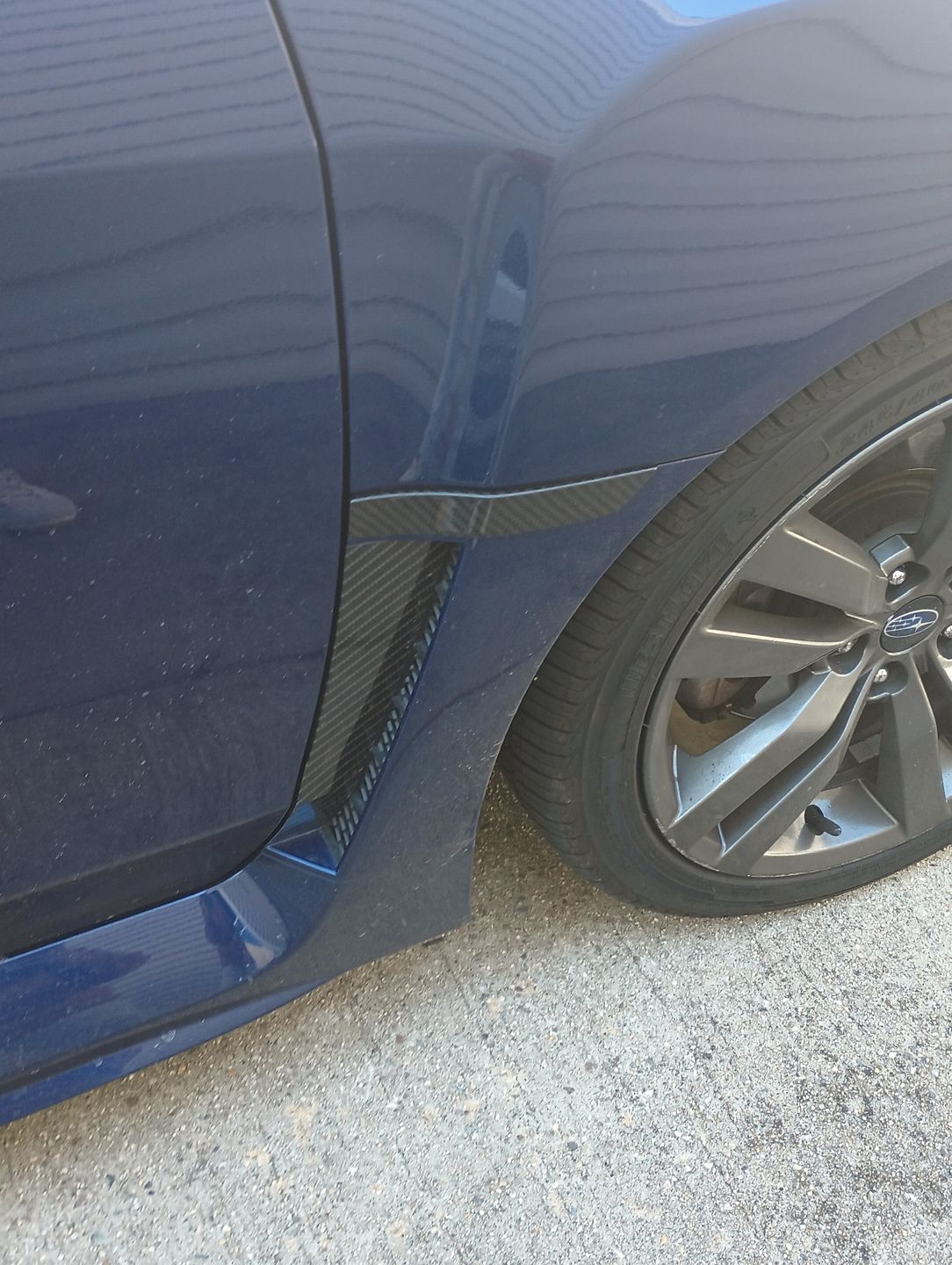 Customer photo review of 2015-21 Subaru WRX/STi Carbon Fiber Side Emblem Badge Replacement
