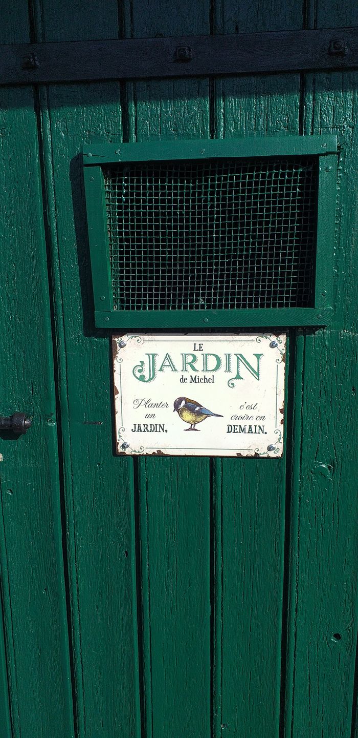 Customer photo review of Joie dans le jardin - Plaque de porte personnalisée