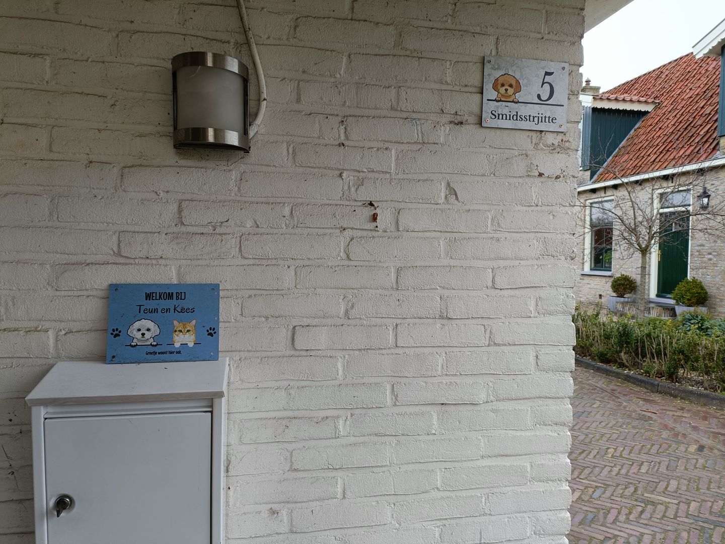 Customer photo review of Huisnummer met marmerlook - Gepersonaliseerd deurbordje