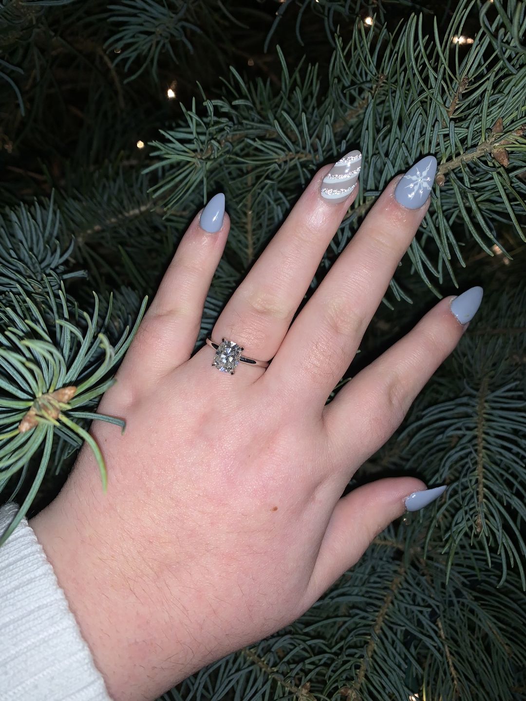 Customer photo review of Elongated Cushion Moissanite Solitaire Engagement Ring