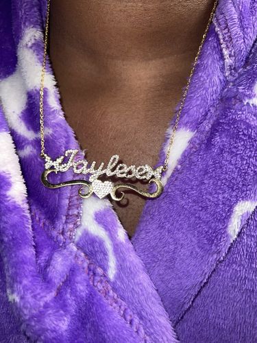 Customer photo review of Iced Out Butterfly Pendants