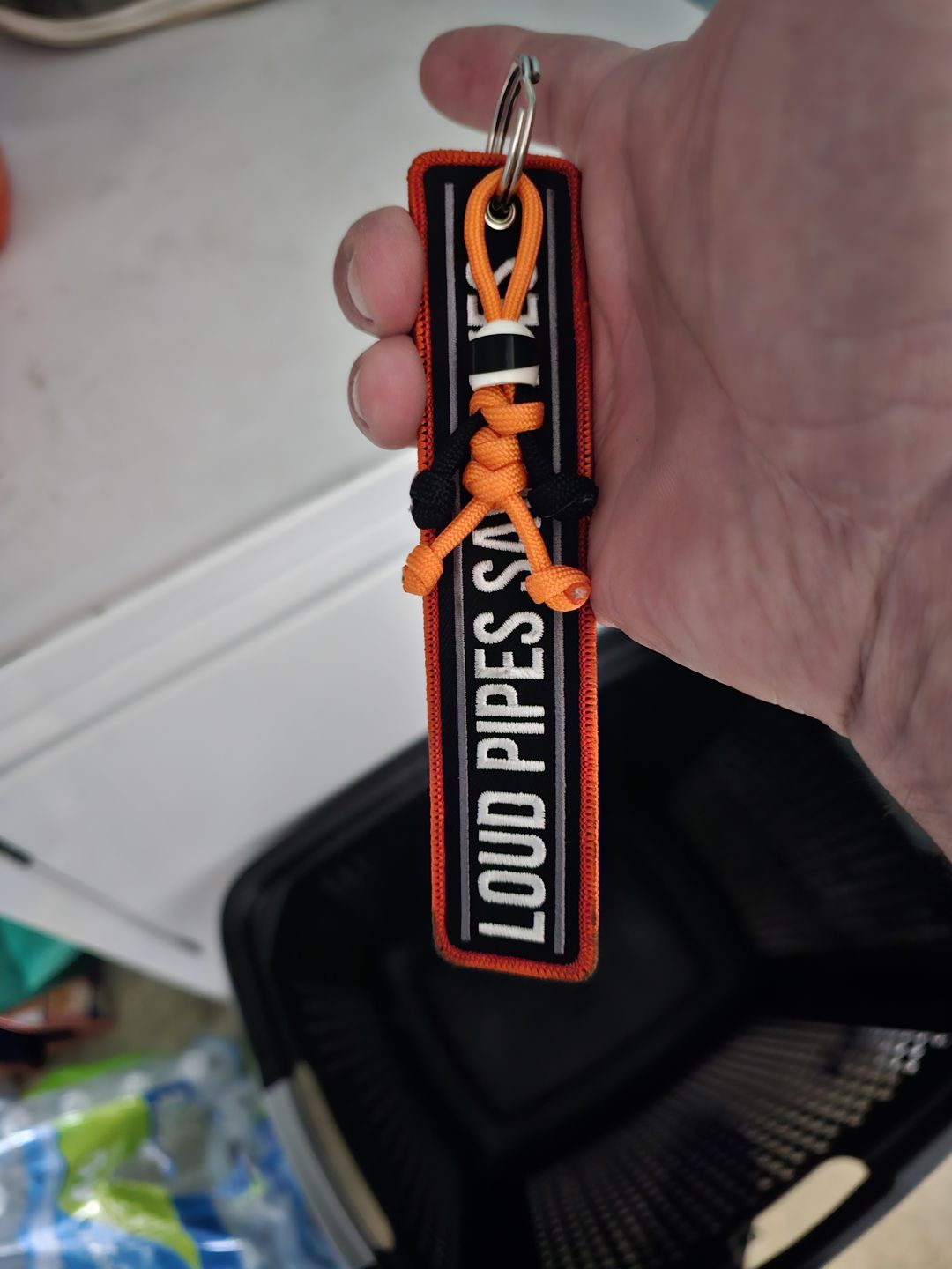 Customer photo review of Orange Biker Buddy Paracord Keychain
