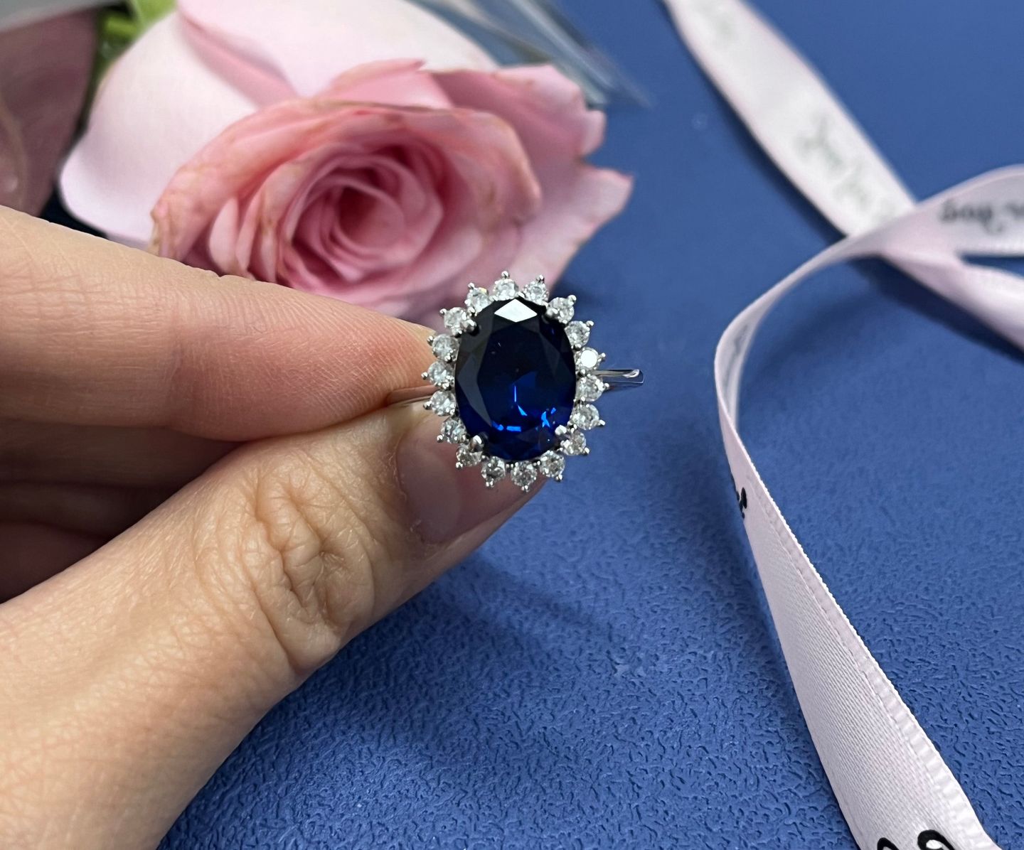 Customer photo review of 4.5 Carat Halo Oval Cut Blue/Red/Green/Yellow Sapphire Engagement Ring In Sterling Silver