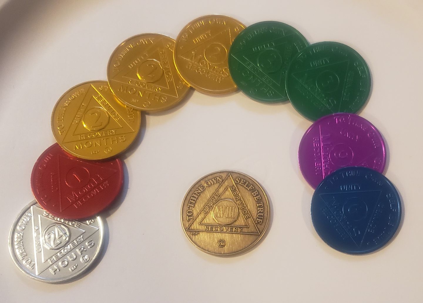 Customer photo review of Sobriety Mint Infinity Aluminum AA Meeting Newcomer Sobriety Chips/Coins/Tokens - 9 Months - Green