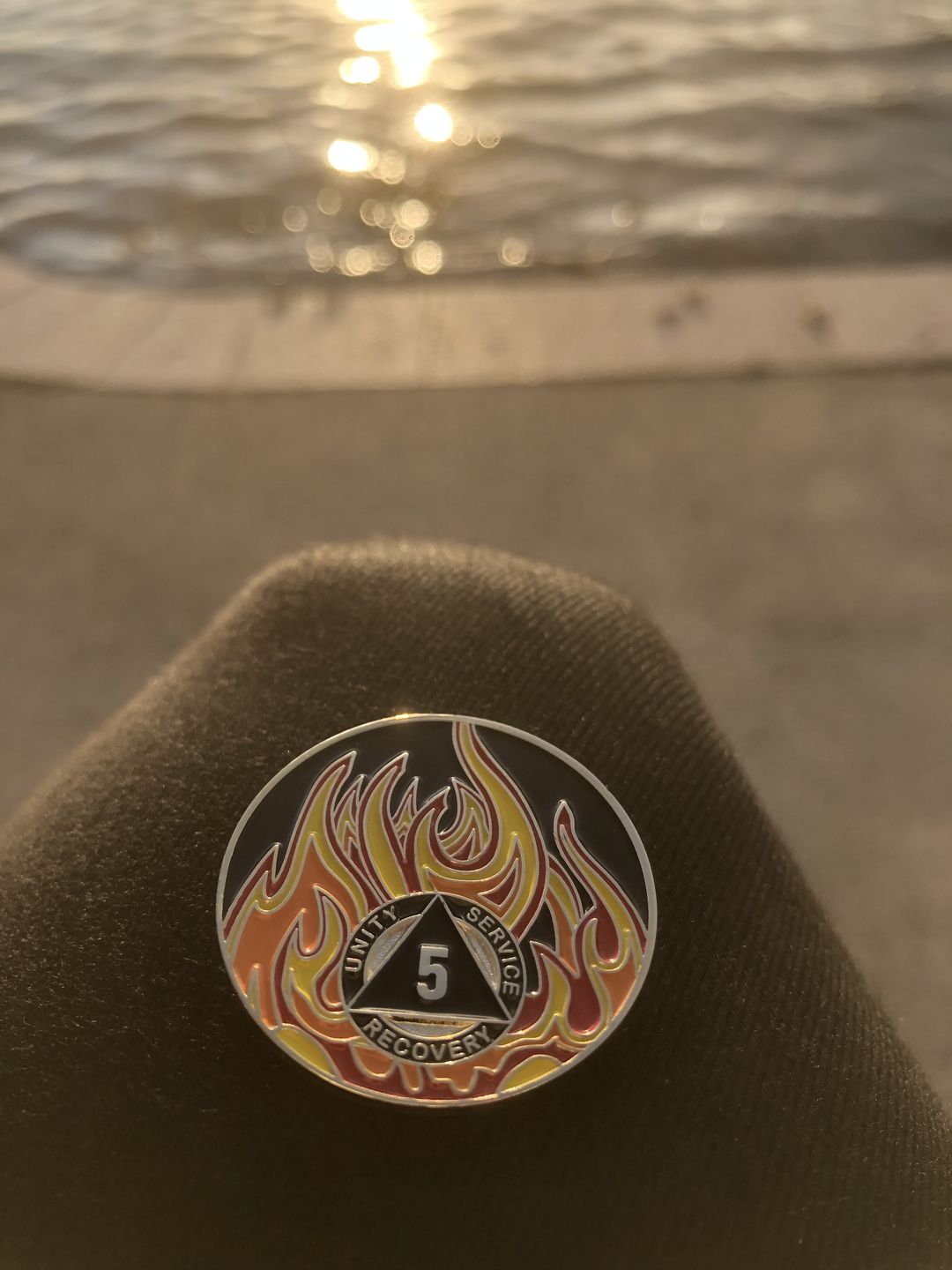 Customer photo review of 5 Year Sobriety Mint Twisted Flames Gold Plated AA Recovery Medallion/Chip/Coin - Black/Red/Orange/Yellow