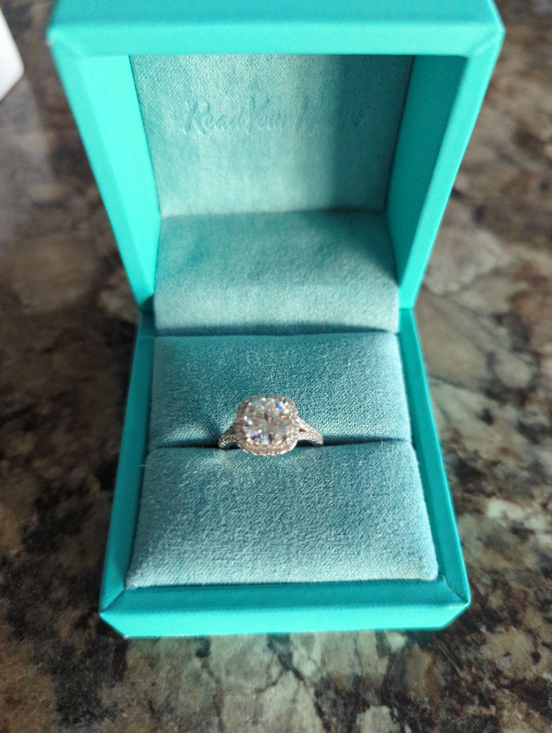 Customer photo review of Moissanite Split Shank Square Halo Pave Sterling Silver Wedding Ring