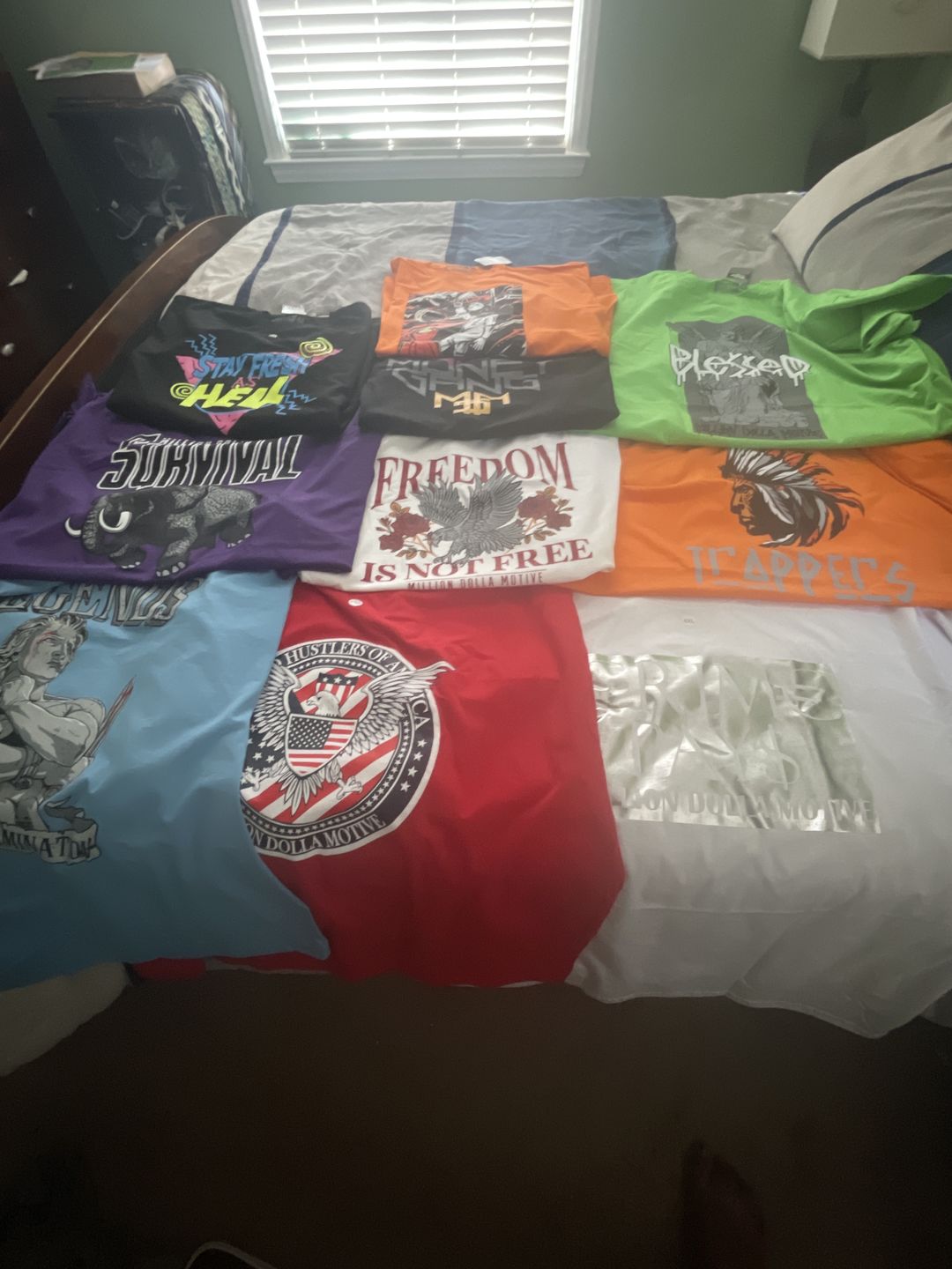 Customer photo review of Mystery Box of 12 T-Shirts