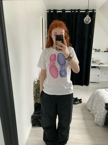 Customer photo review of 'We Come as a Pair' baby tee