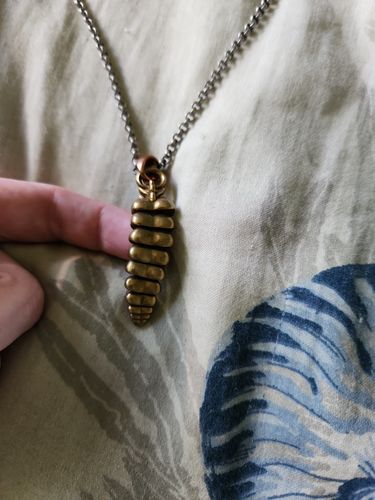 Customer photo review of Rattlesnake Tail Pendant