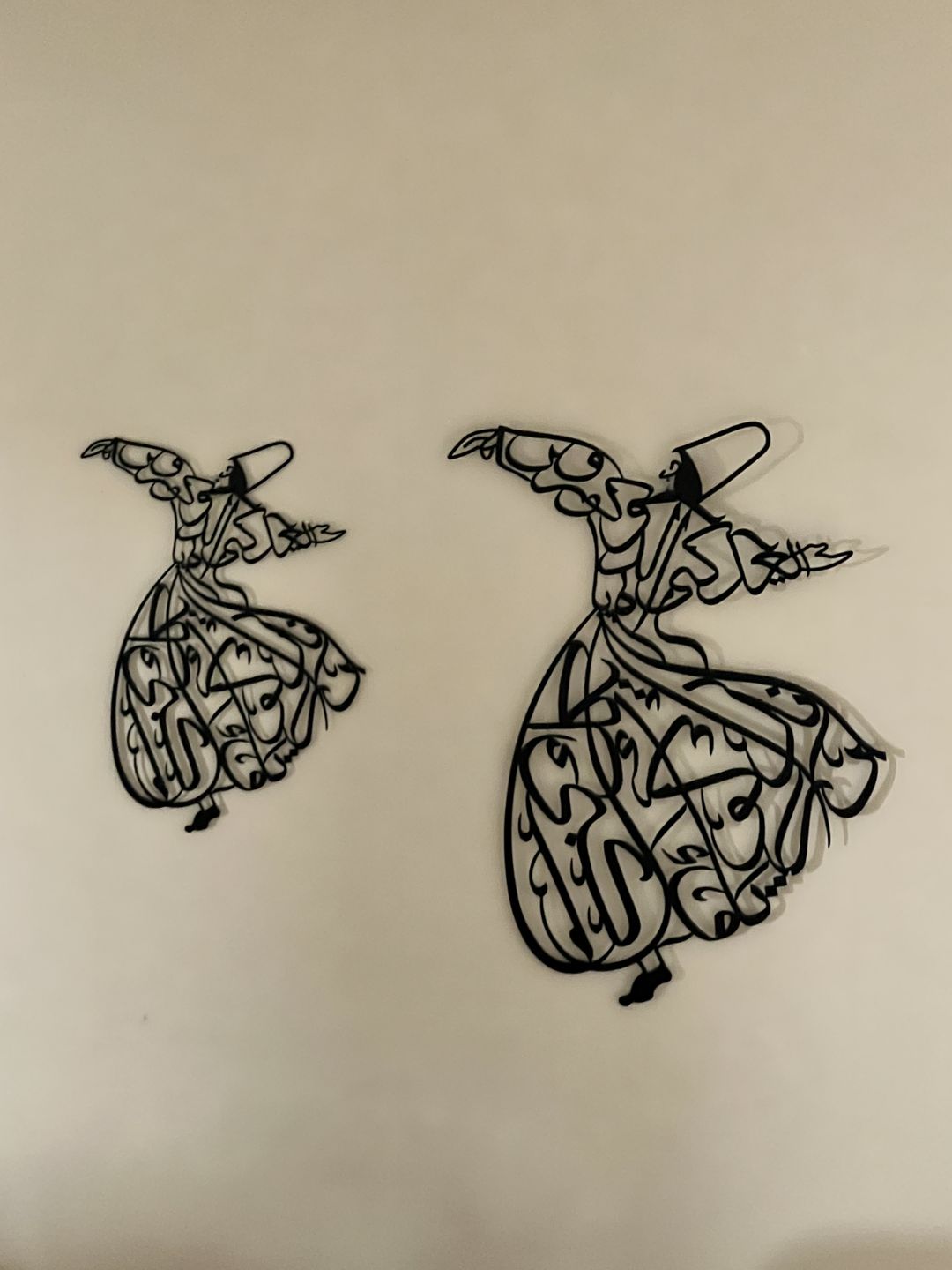 Customer photo review of Whirling Dervish Metal Islamic Wall Art