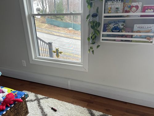 Customer photo review of Standard White Baseboard Covers by the Foot