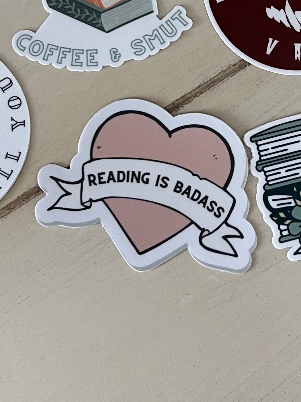 Customer photo review of reading is badass sticker