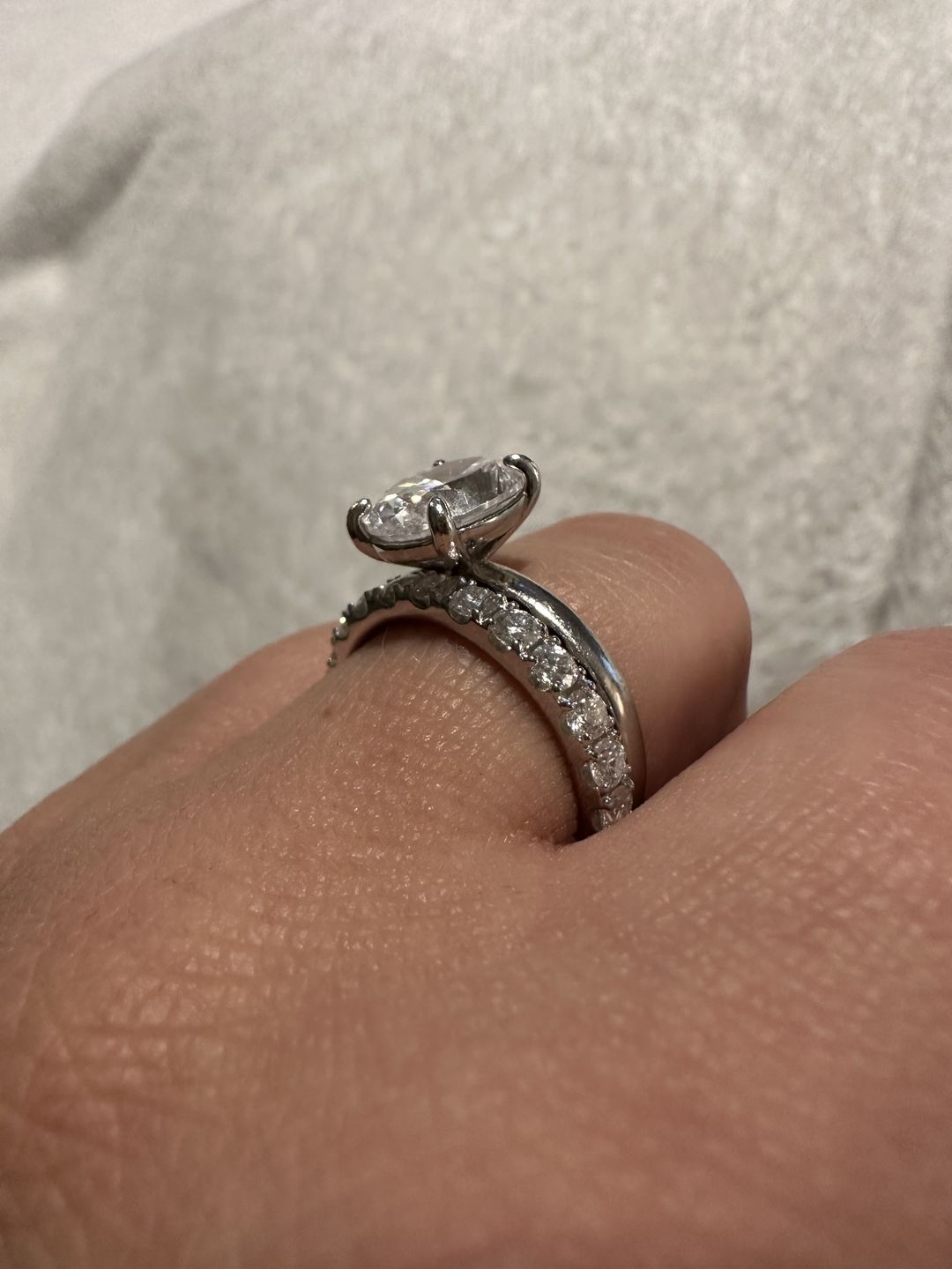 Customer photo review of Pave Moissanite Eternity Wedding Band Ring In Sterling Silver
