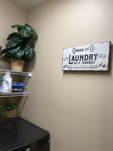 Customer photo review of Laundry Room Sign ll